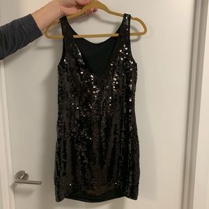 Never worn banana republic black sequin dress.